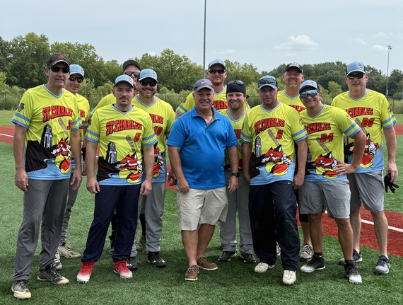 A group photo of the St. Charles police officers with the mayor during Battle of the Badges softball tournament in 2025.