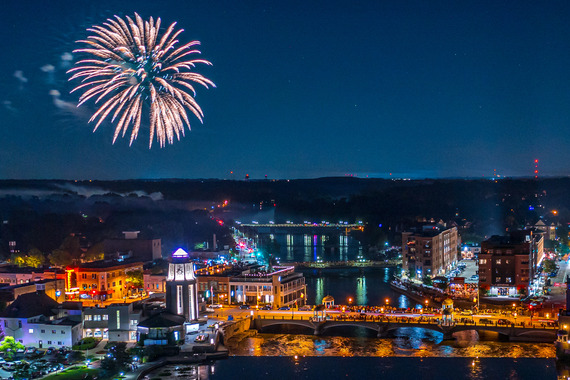 Fireworks go off over the municipal building in downtown St. Charles.