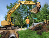A construction worker on site during road work.