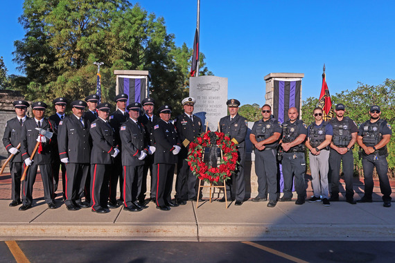 The fire and police departments attend the 9/11 ceremony's 25th anniversary at the Freedom Shrine in St. Charles.