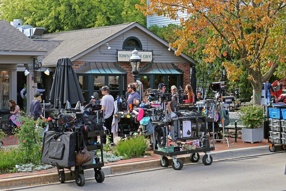 Film crews set up outside Townhouse Books in St. Charles.