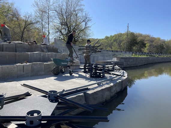 DNR staff install a mossback structure.