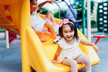 Children Playing on a Slide