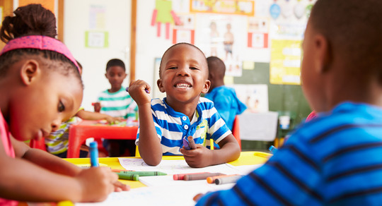 Smiling child in classroom