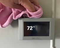 Dust your thermostat for energy efficiency
