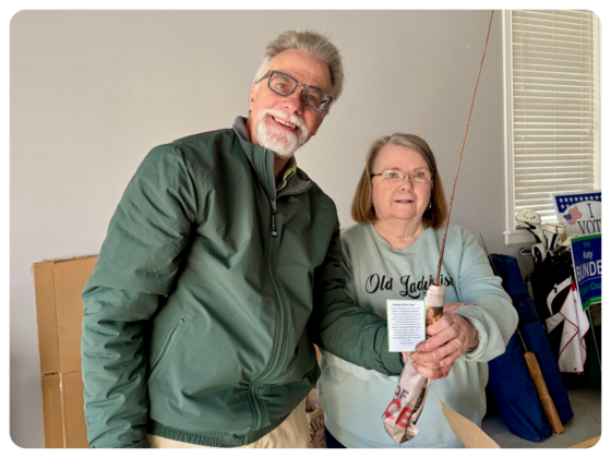 Paul Brennan and Becky Fry holding a tree pruning model