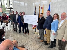 Image of Kent County Health Department and Kent County Community Action accepting a check from the  U.S. Housing and Urban Development