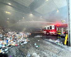 Image of fire likely caused by a lithium-ion battery improperly placed in a recycling cart