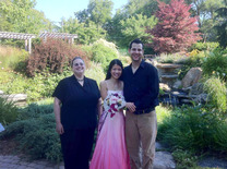 Image of a couple posing in the Grand Ideas Gardne