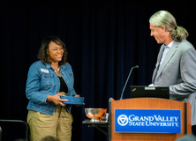 Image of Commissioner Michelle McCloud receiving the award