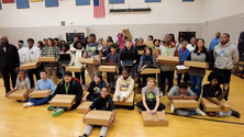 Image of 50 Alger Middle School students with free laptops 