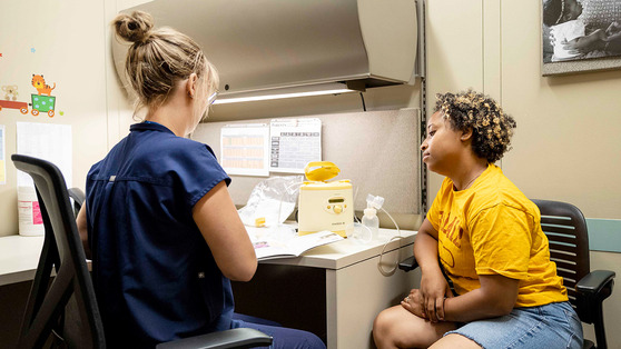 Image of a woman talking with a nurse about breastfeeding