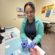 Nurse performs an HIV test