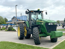 Image of a tractor in front of a Culver's restaurant