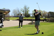 Man Playing Golf at Kaufman Golf Course