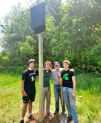 Image of group with bat box