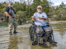 Image of two veterans fishing