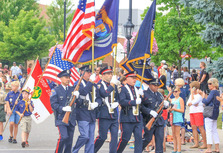 Image of Veterans Services walking in a 4th of July parade