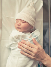 Image of a swaddled baby