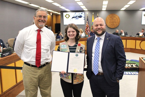Board Chair Ben Greene and Commissioner Walter Bujak with Julie Celori
