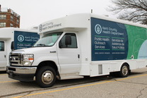 Pictured is one of the KCHD's mobile units parked in front of another mobile unit.