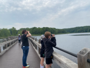 A Mother and Her Two Sons Birding at Pickerel Lake Park as Part of the Blandford Nature Center's Nature Neighbors Programming