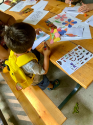 Little Boy Participating in Nature Crafts in a Kent County Parks as Part of Blandford Nature Center's Nature Neighbors Programming