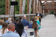 Kent County Administrator Al Vanderberg Speaking at a Grand River Greenway Celebration Hosted on the Bridge at Riverfront Park in Lowell