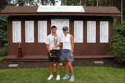Kent County Amateur Championship Winner, Will Preston, Poses Next to His Mom as he Holds a Trophy