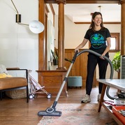 Image of a woman vacuuming