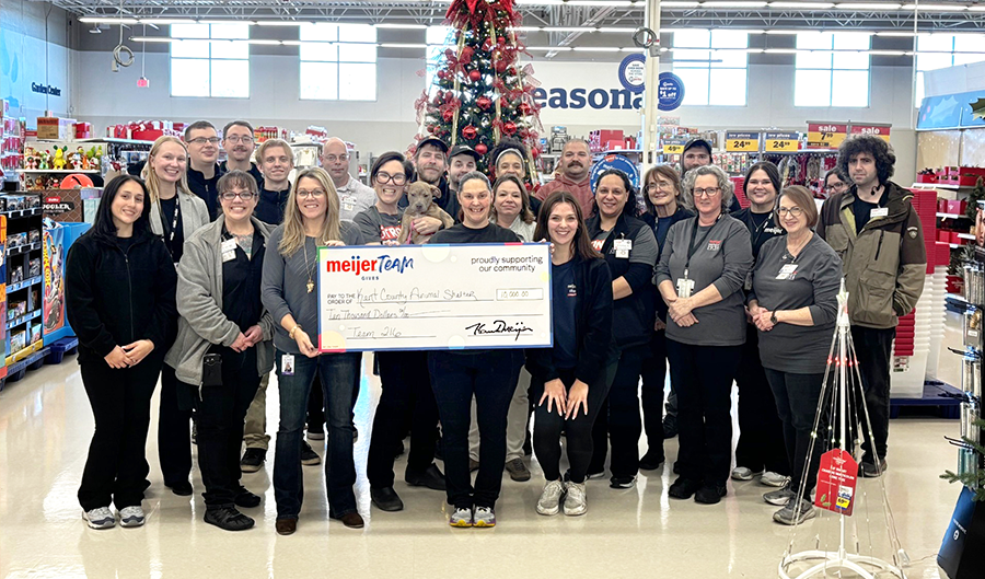 Image of the Standale Meijer staff and Animal Shelter staff with the check