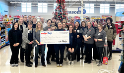 Image of the Standale Meijer staff and Animal Shelter staff with the check