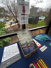 Picture of a Table at the Health Department with Free Radon Test Kits and Educational Supplies