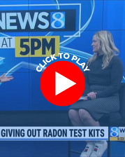 Screengrab of a Kent County Health Department Representative Being Interviewed by WOOD-TV 8 with a Play Button Icon and Text the Reads Click to Play