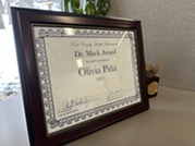 In 2025, the Dr. Douglas Mack Award was Granted to Olivia Pina, an employee who exemplifies teamwork and collaboration