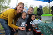Family Gathers at a Booth Along the Hansen Nature Trail During the Annual Discover! Millennium Park Nature Event