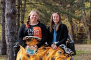 Kate Perkins (left) and Hanna Yob (right) Pose During Wabasis Campground's Annual Trick-or-Treating Event