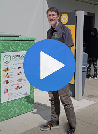 Video still with play button for food scraps program