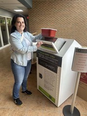 Image of a woman using a safesharps dropoff box