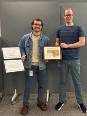 April's People's Champion Award Recipient, Jacob Lahmann, Hands Off Award to May's Recipient, Marcus Igo