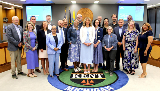 Board of Commissioners wearing blue