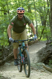 Mountain Biker Testing the New Trails on a Summer Day at Johnson Park