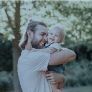 Father holding child