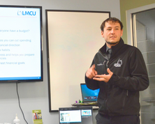 Lake Michigan Credit Union representative giving a speech