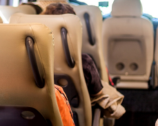 Image of people sitting in a bus