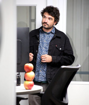 man working with apples for Tech Week