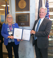 Chief Judge Deborah McNabb with Senator Gary Peters