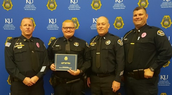 Officer Blasi with Newton Police lieutenants and deputy chief