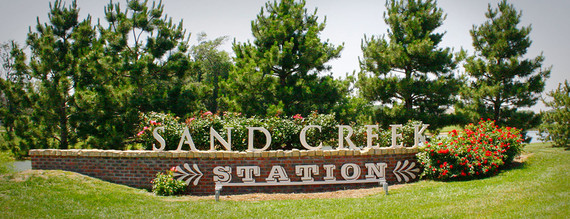 Entrance sign for Sand Creek Station subdivision