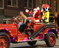 Santa in a fire truck in Parade of Lights 